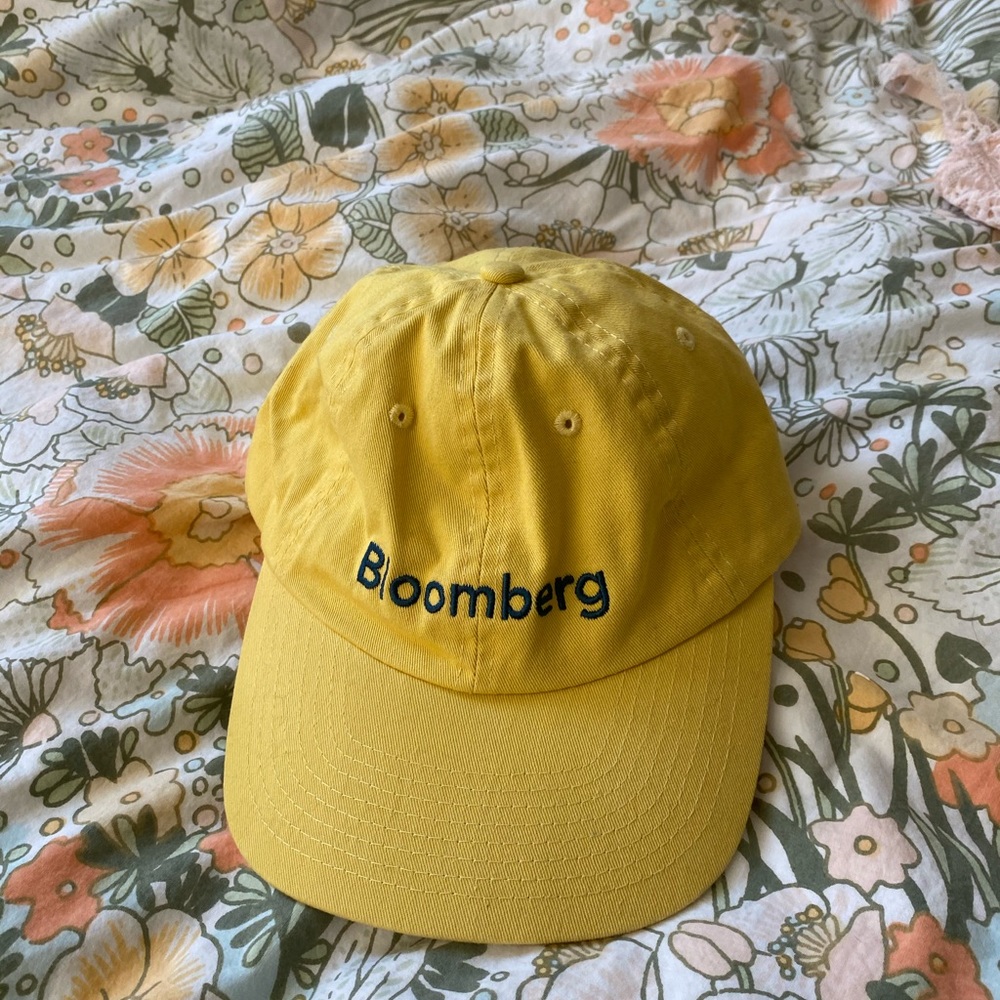 Bloomberg yellow baseball cap